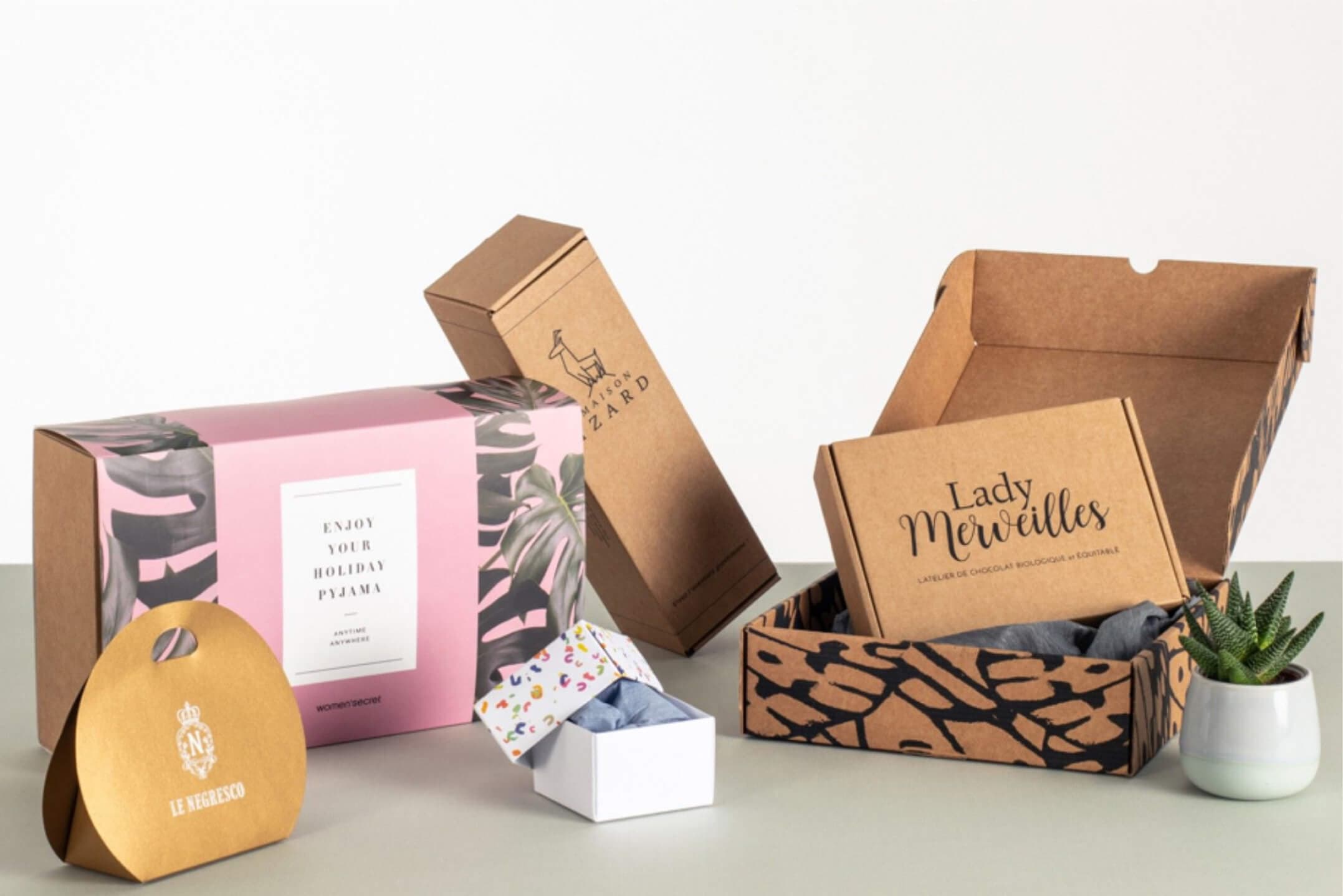A range of printed custom boxes, mailers and carriers produced by Custom Box Center